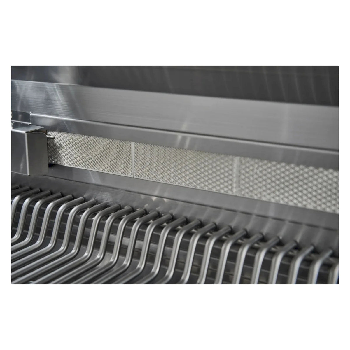 Stainless steel grill grates with parallel bars inside a gas grill firebox