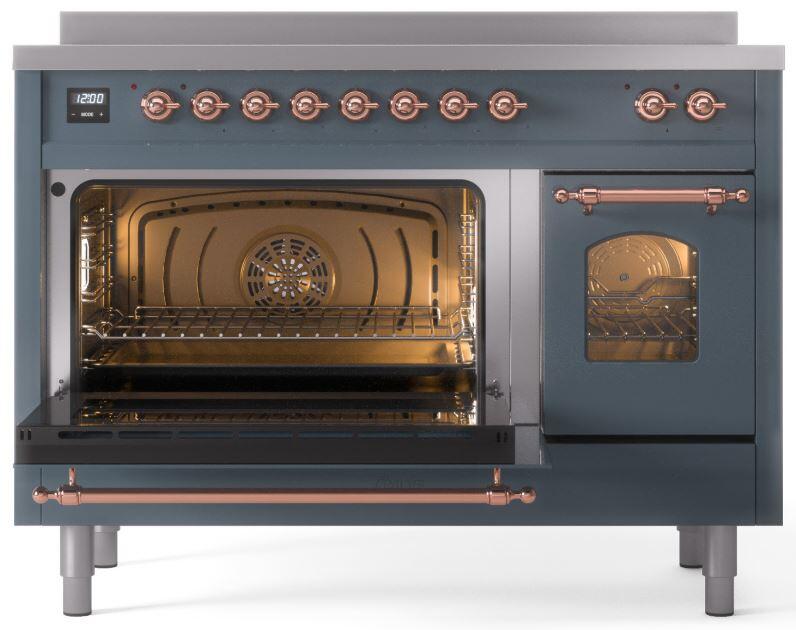 Blue-grey induction range with left oven door open, copper trim, and right oven door closed.