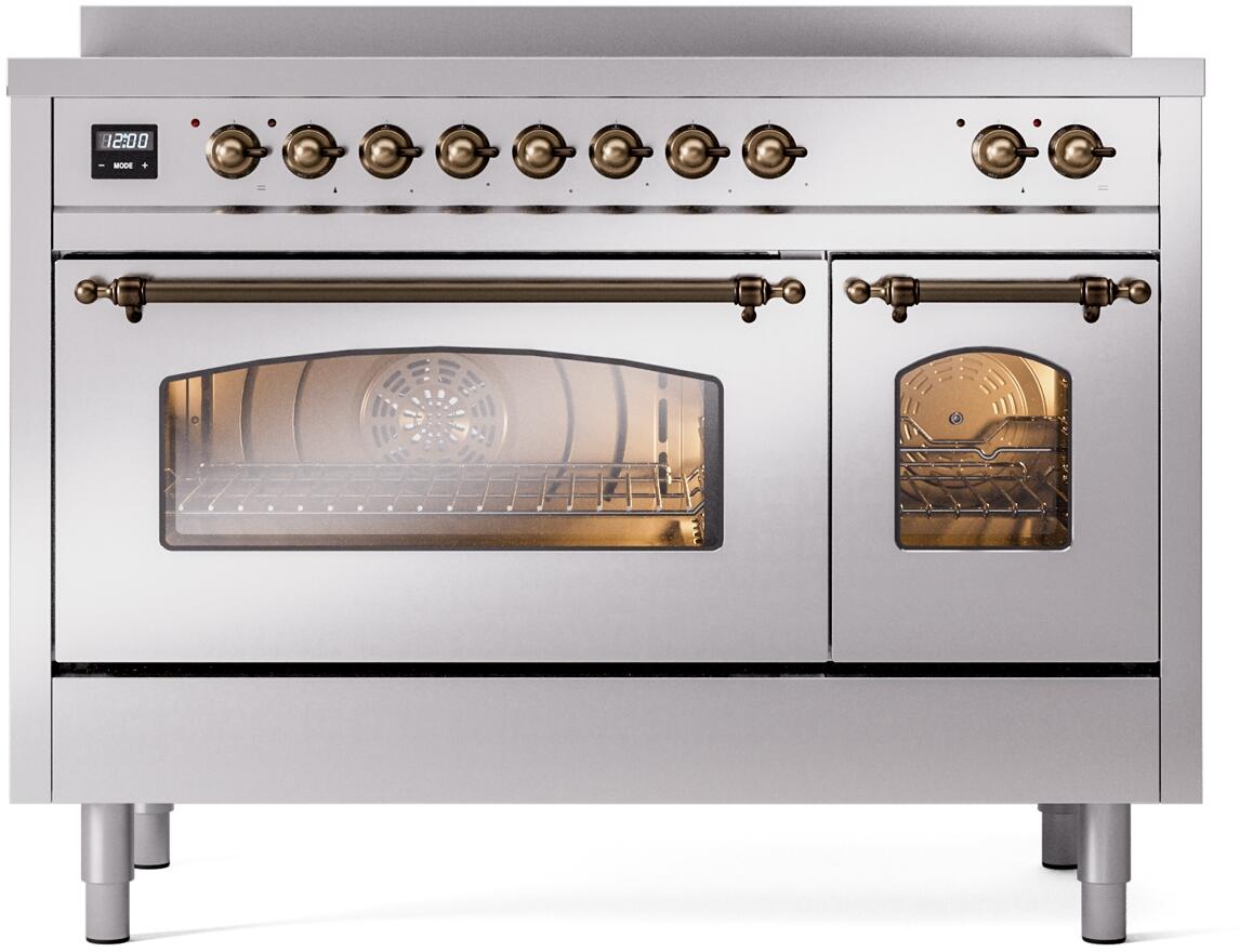 Stainless electric induction range with bronze knobs, oven door windows, and storage doors