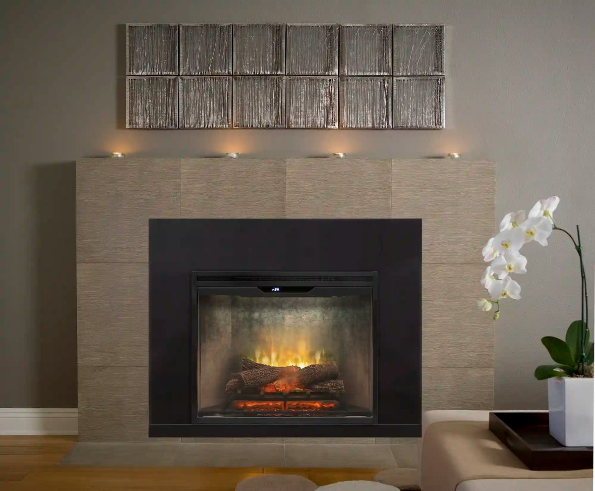 Fireplace installation trim with dark frame surrounding the burning firebox