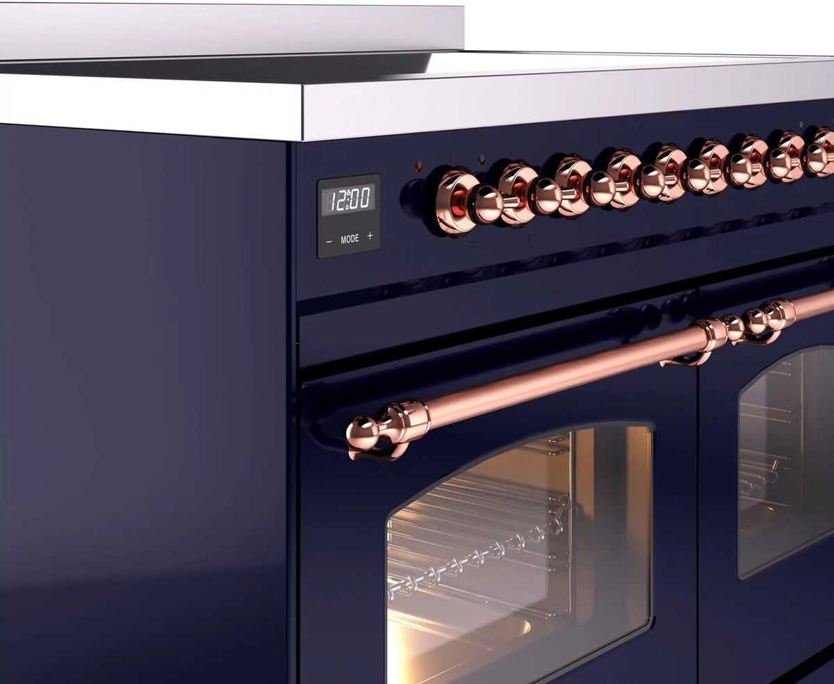 Midnight blue electric induction range control knobs with copper accents and digital display
