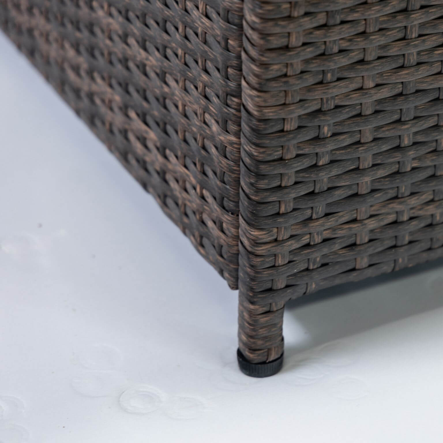 Brown wicker fire pit stand with corner leg detail