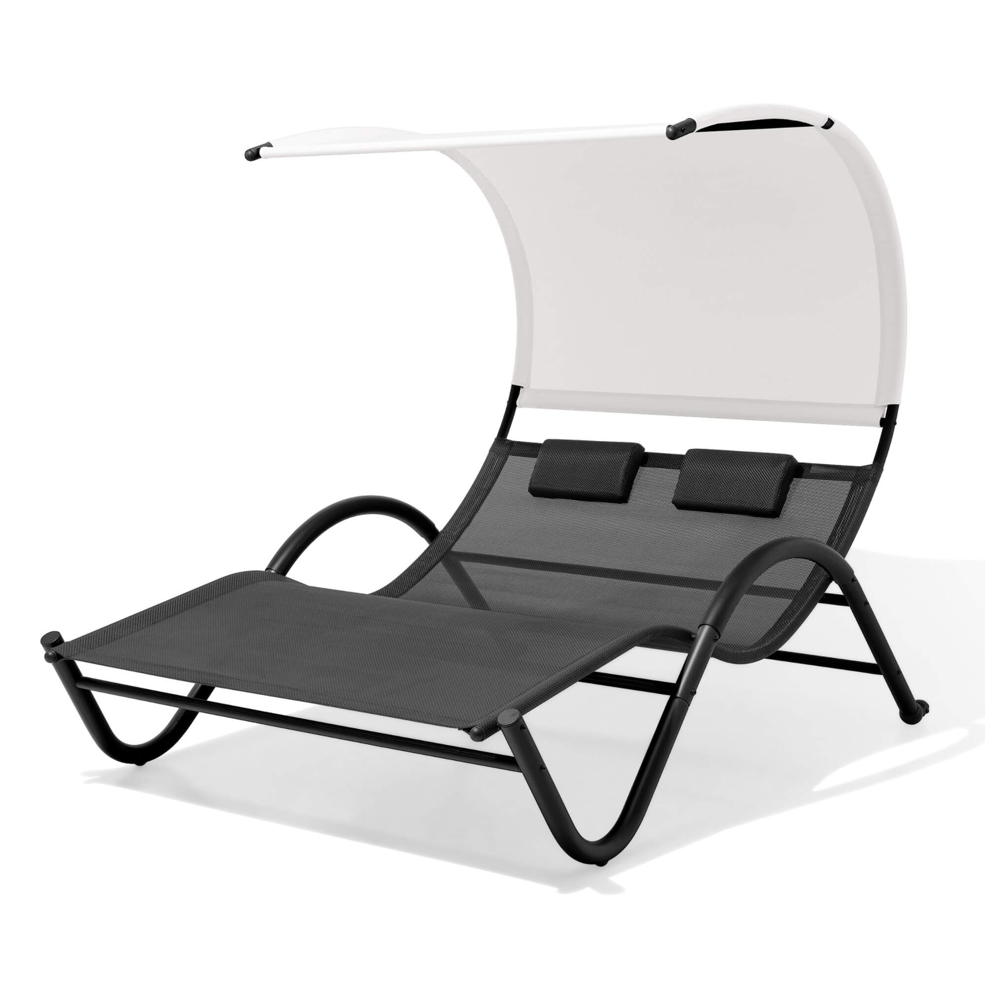 Outdoor lounge daybed with canopy, dark gray woven seat and white curved canopy
