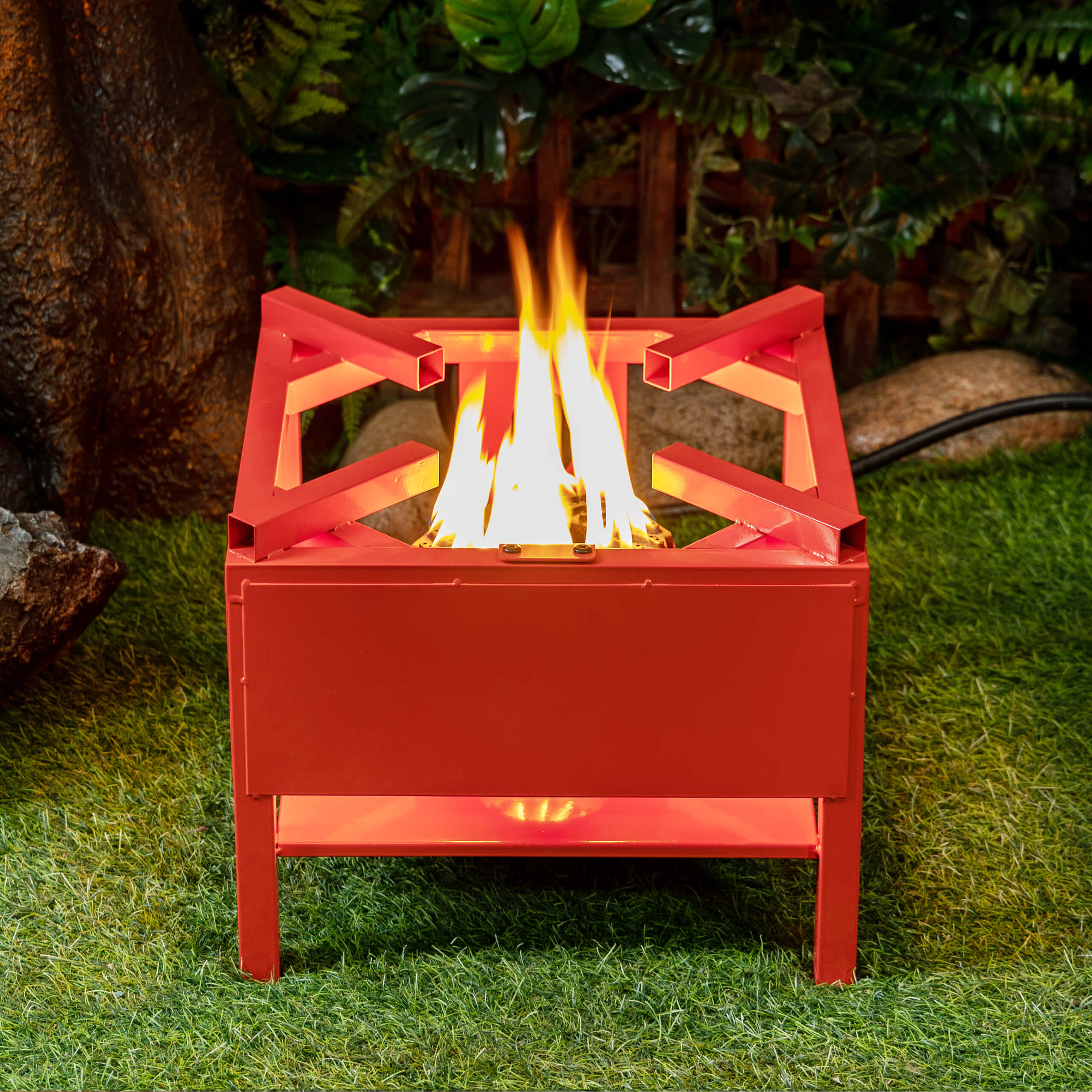 Red outdoor propane burner cooker stand with open flame and sturdy side frame