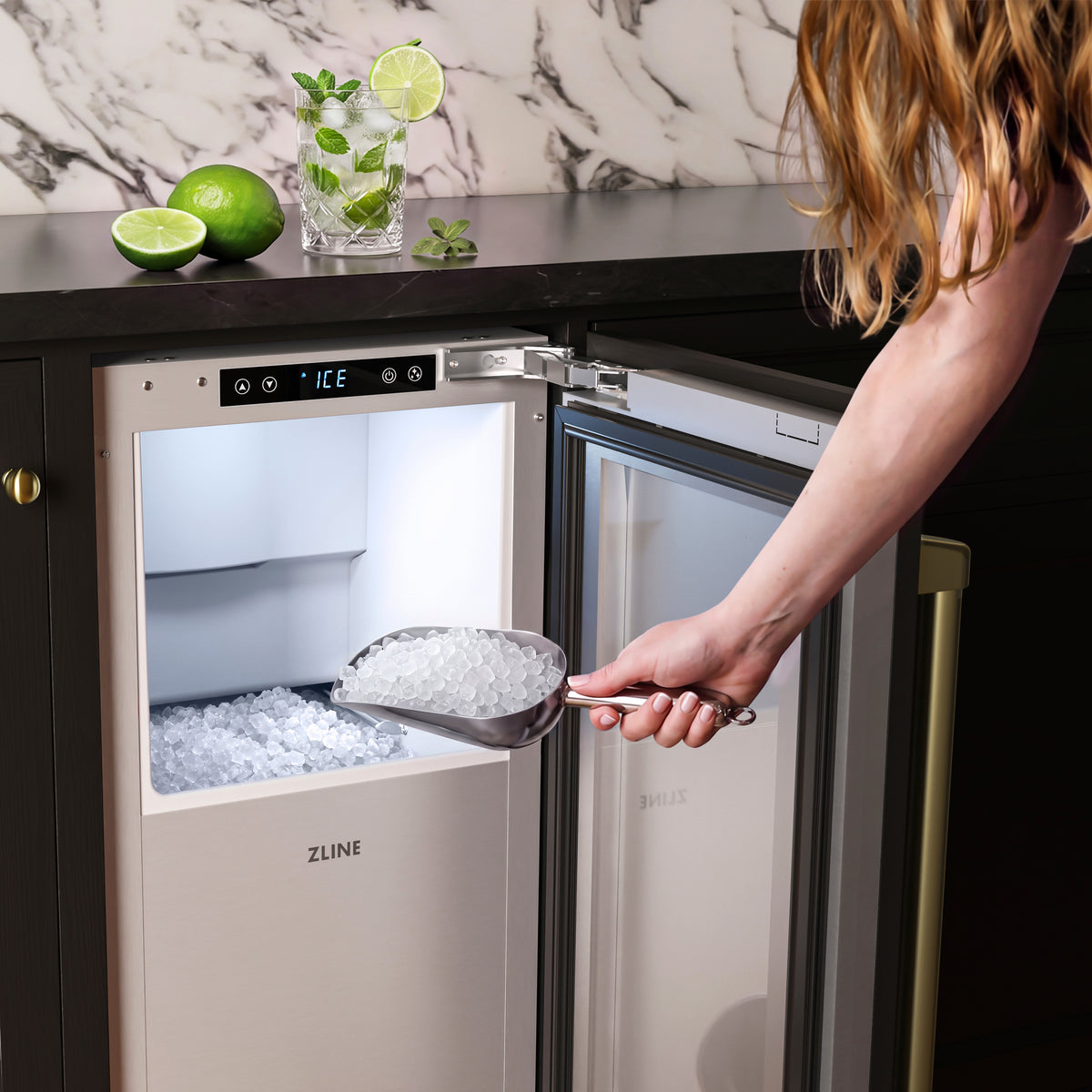 Scooping nugget ice from the ZLINE Autograph Edition panel ready ice maker (INGDPZ-15-CB)