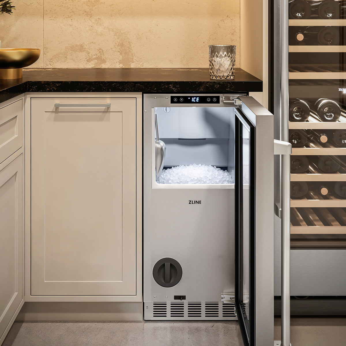 ZLINE stainless steel nugget ice maker in an indoor cellar nook with the door open (INGD-ST-15)