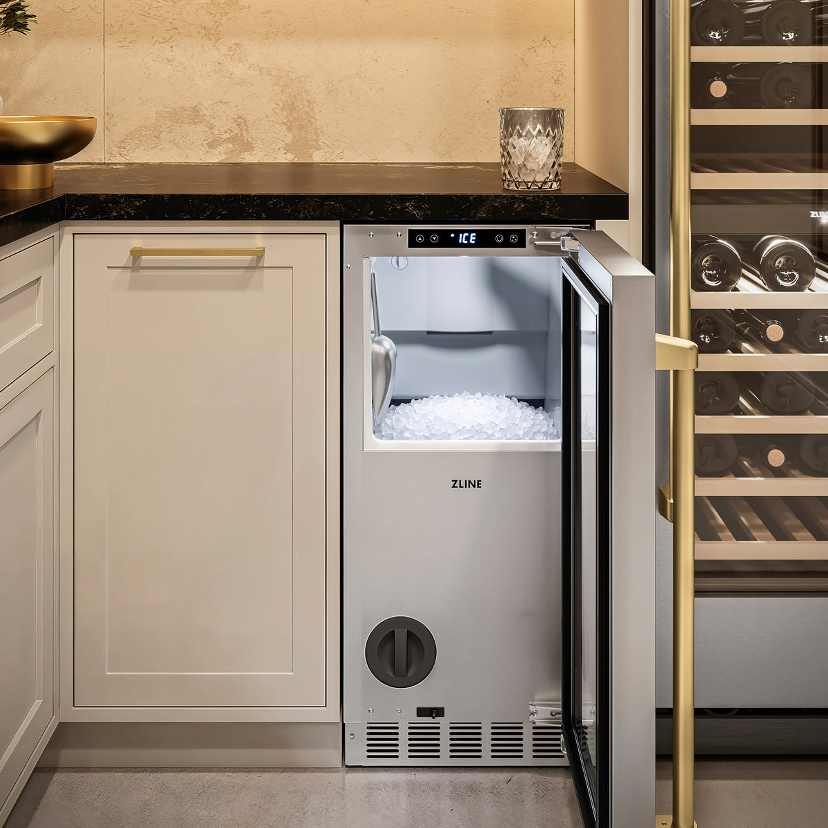 ZLINE Autograph Edition stainless steel nugget ice maker in a cellar nook with the door open (INGDZ-ST-15-CB)
