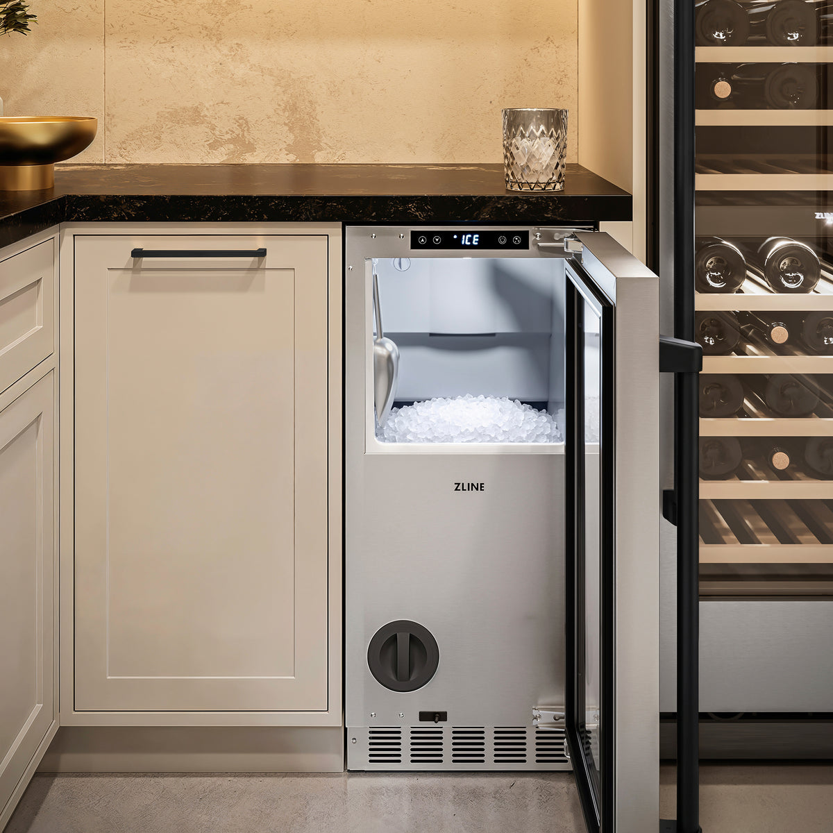 ZLINE Autograph Edition stainless steel nugget ice maker in a cellar nook with the door open (INGDZ-ST-15-MB)