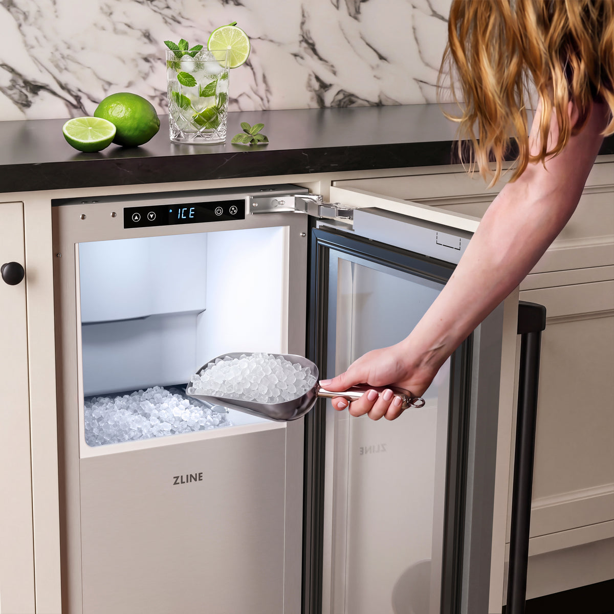 Scooping nugget ice from the ZLINE Autograph Edition panel ready ice maker (INGDPZ-15-MB)