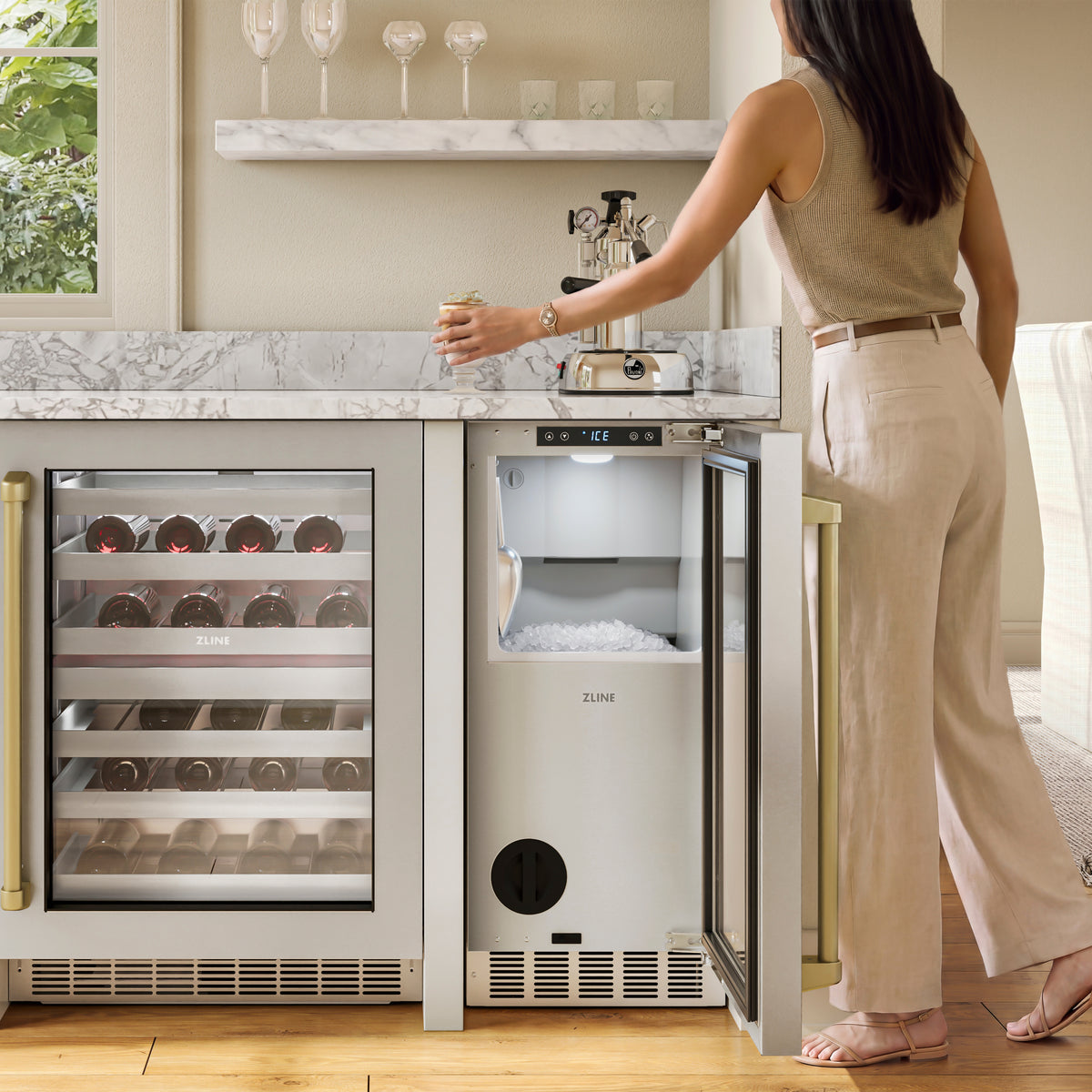 Serving nugget ice from the ZLINE Autograph Edition ice maker in an outdoor bar (INGDZ-ST-15-CB)