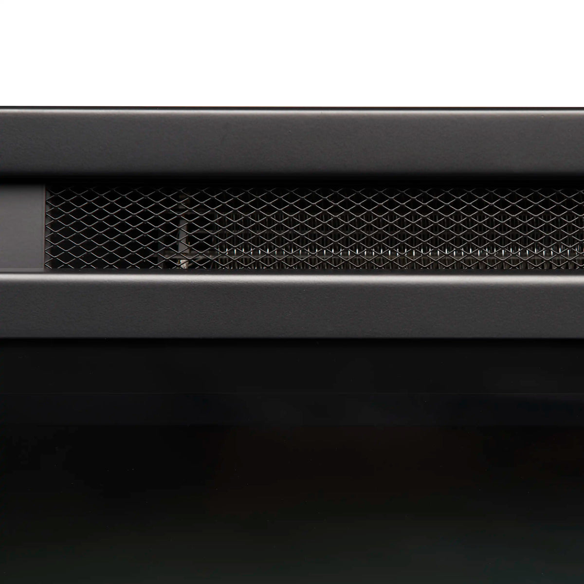 Matte black mesh vent grille inside the electric firebox