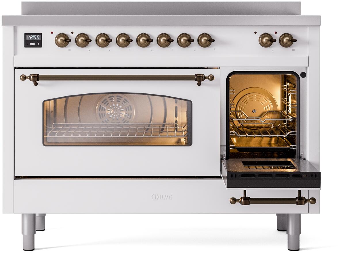 White freestanding induction range with bronze-trim door windows, large and small ovens
