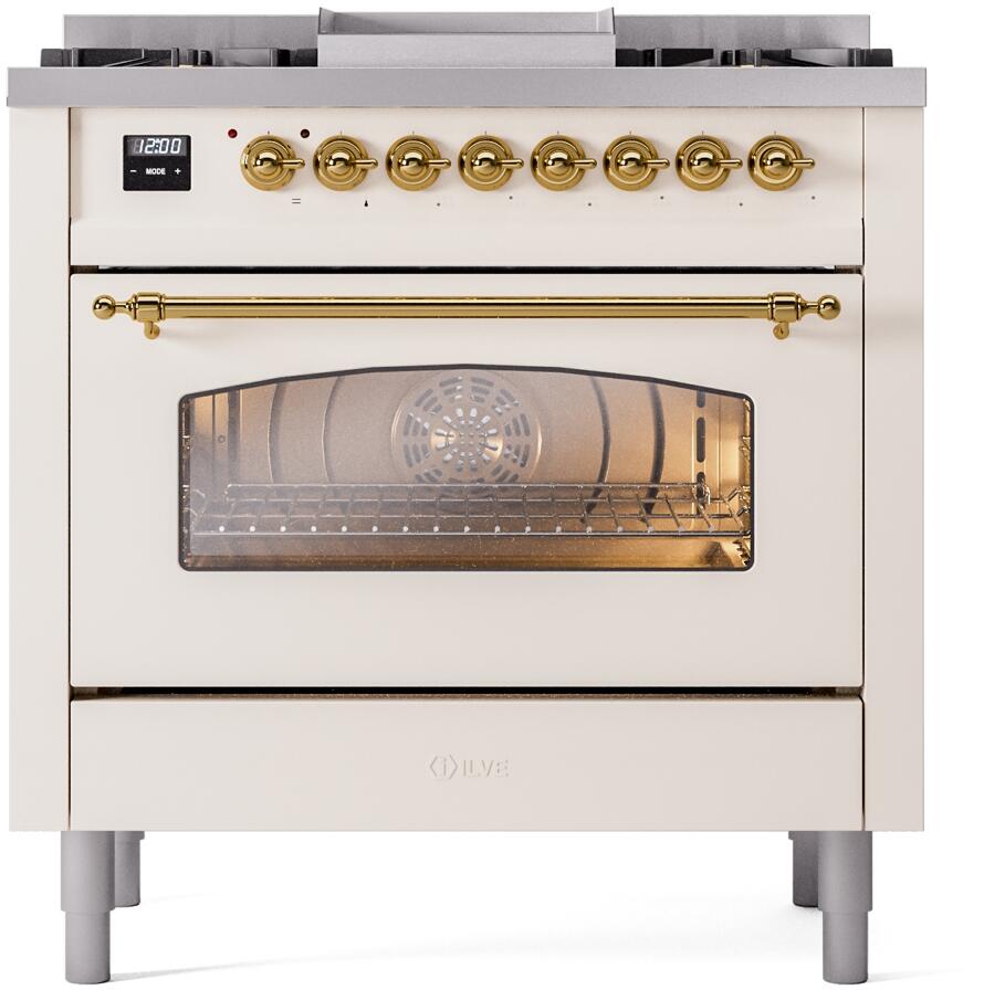 Antique white dual fuel range front with brass rail handle, lit oven window, knob controls