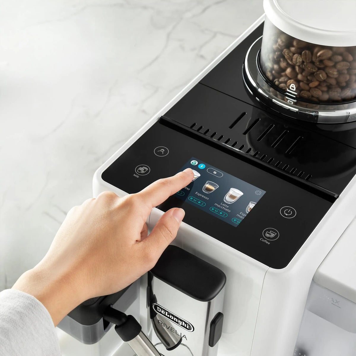 White espresso machine with touchscreen menu and coffee bean hopper area close-up