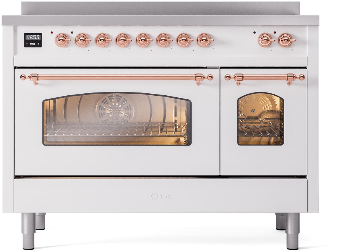 White freestanding induction range with copper control knobs and two oven doors
