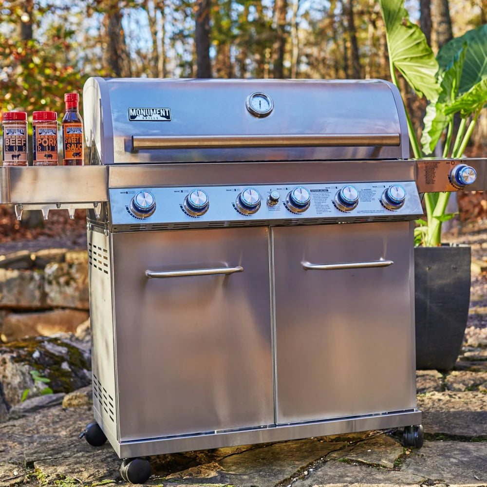 Stainless steel Monument propane gas grill with 6 burners and front cabinet doors