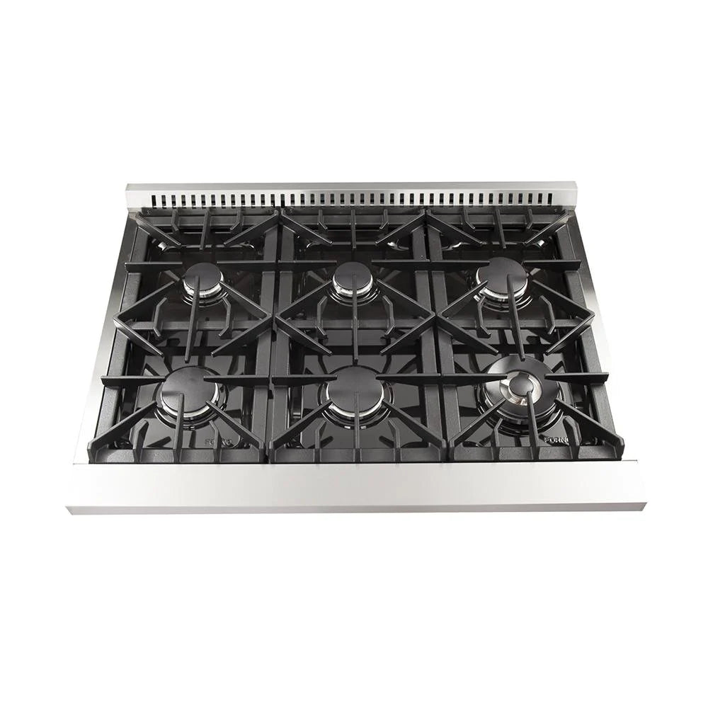 Stainless steel cooktop with black grates and multiple burner heads