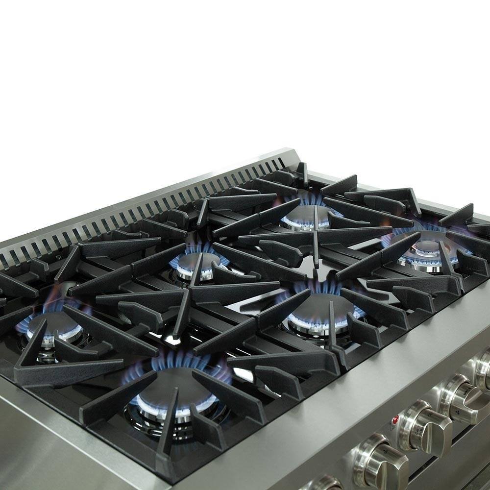 Dual fuel range cooktop from above with black burner grates and griddle-ready surface