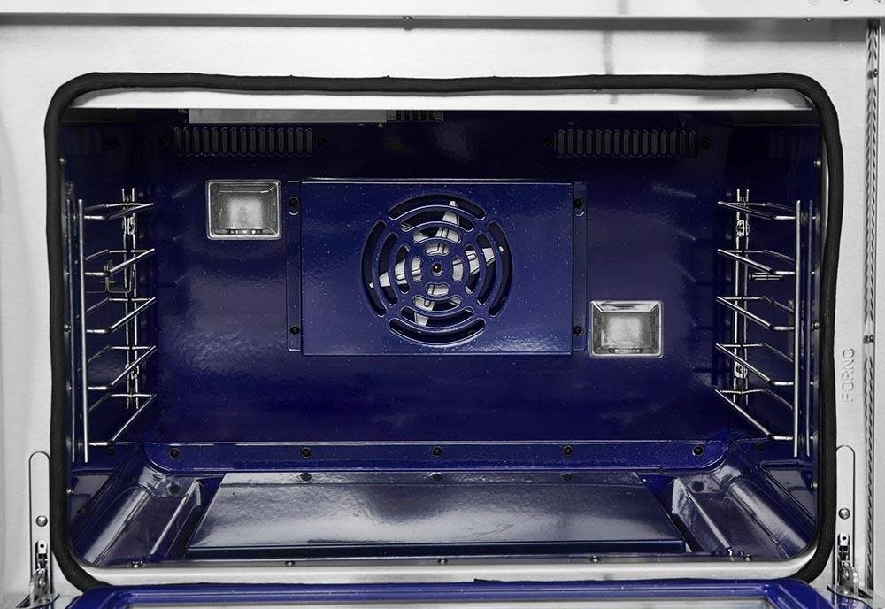 Gas range oven cavity with blue interior and center fan on the back panel