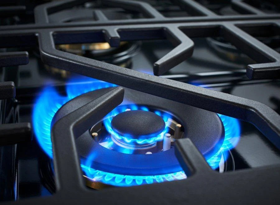 Gas range burner with visible blue flame