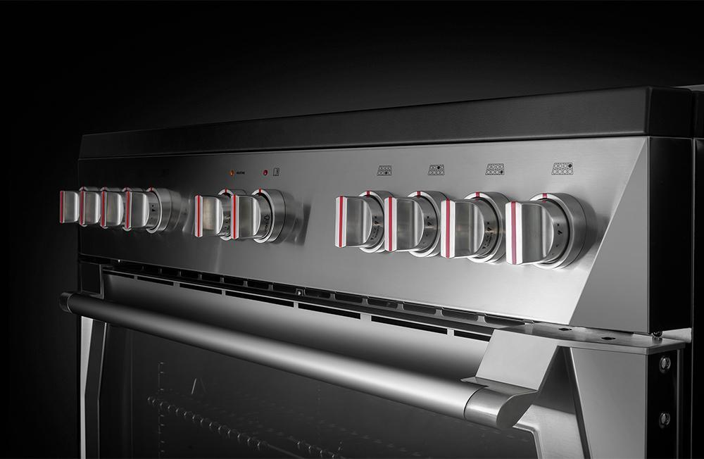 Stainless steel gas range control panel with burner knobs and FORZA logo