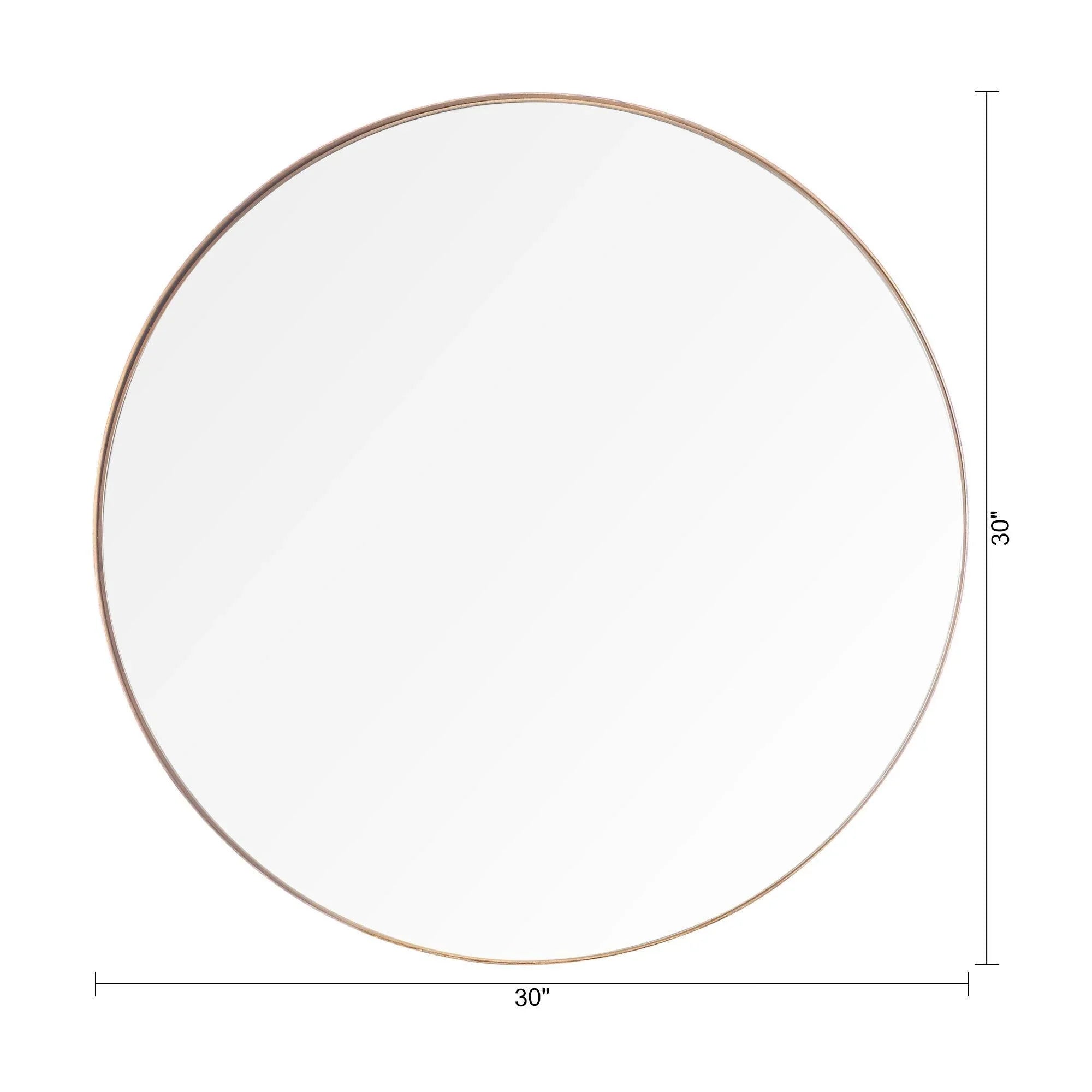 Round wall mirror measuring 30 in wide with thin golden frame.