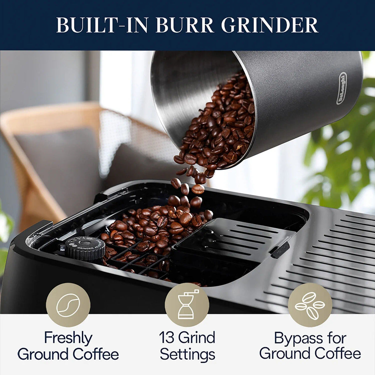 Built-in burr grinder dispensing roasted coffee beans into the grinder chamber