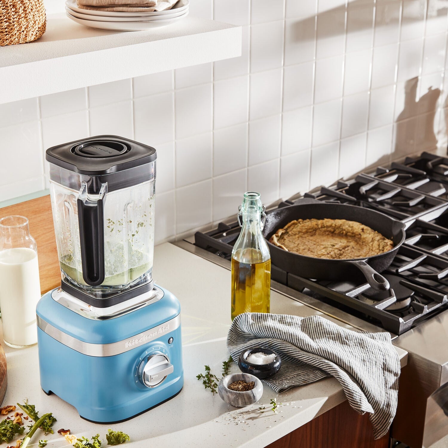 KitchenAid K400 countertop blender with clear 56 oz jar and blue base, black controls