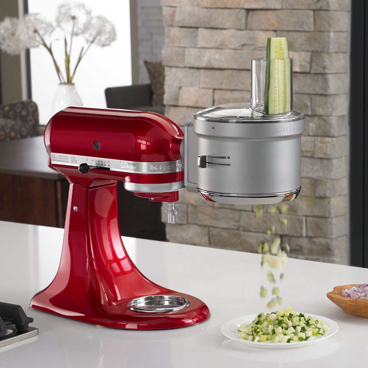 Dicing attachment mounted on red stand mixer with upright stainless bowl