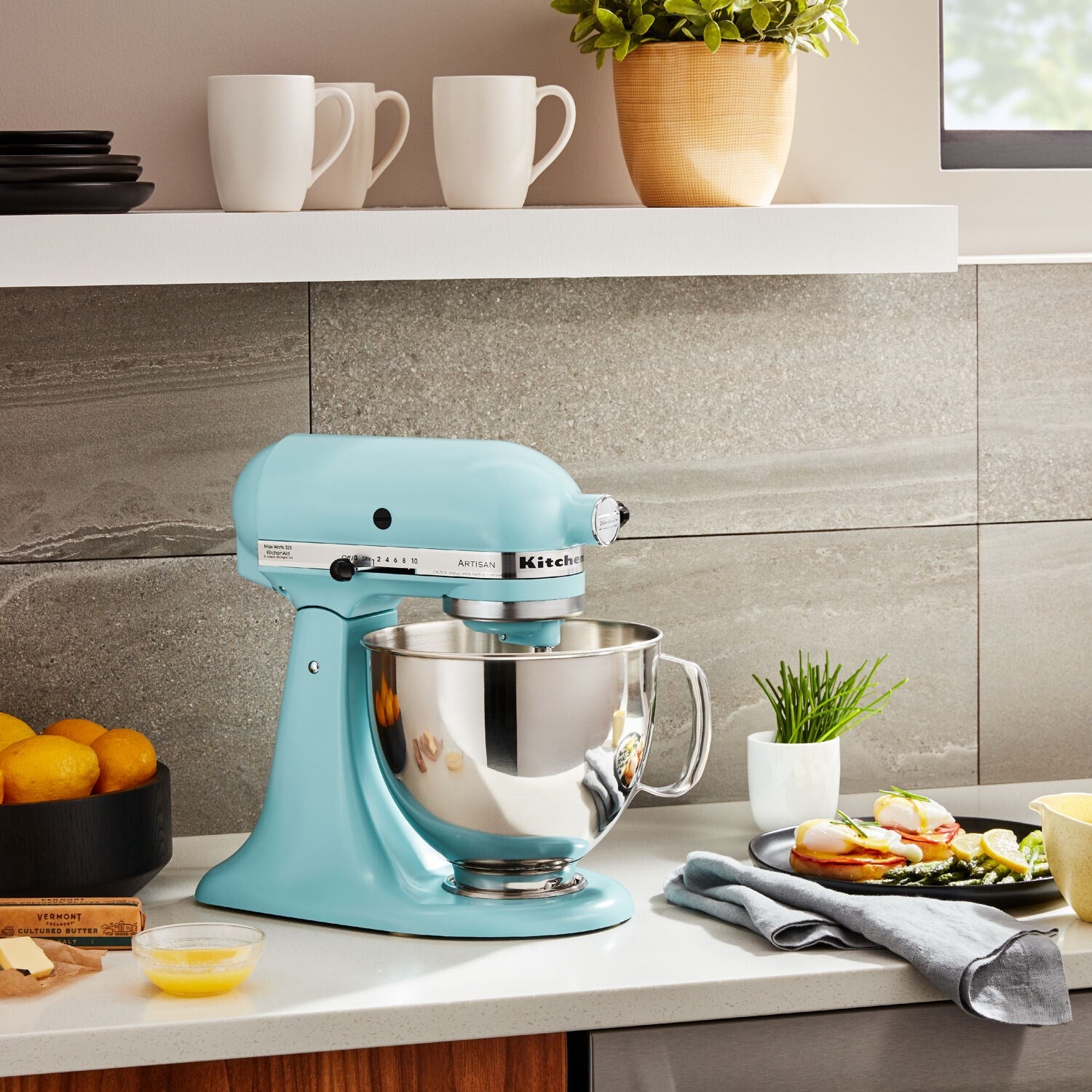 Mineral water blue tilt-head stand mixer with stainless bowl and beater attachment