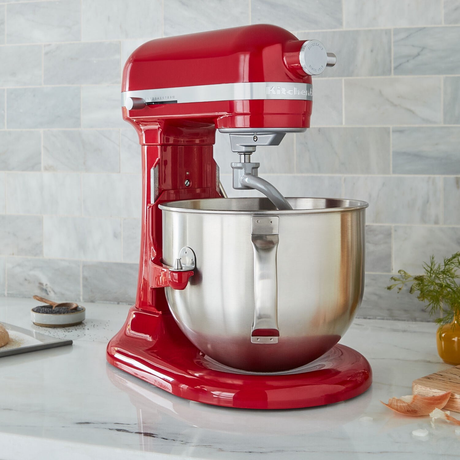 Empire Red stand mixer with stainless bowl and bowl lift, kitchen countertop view