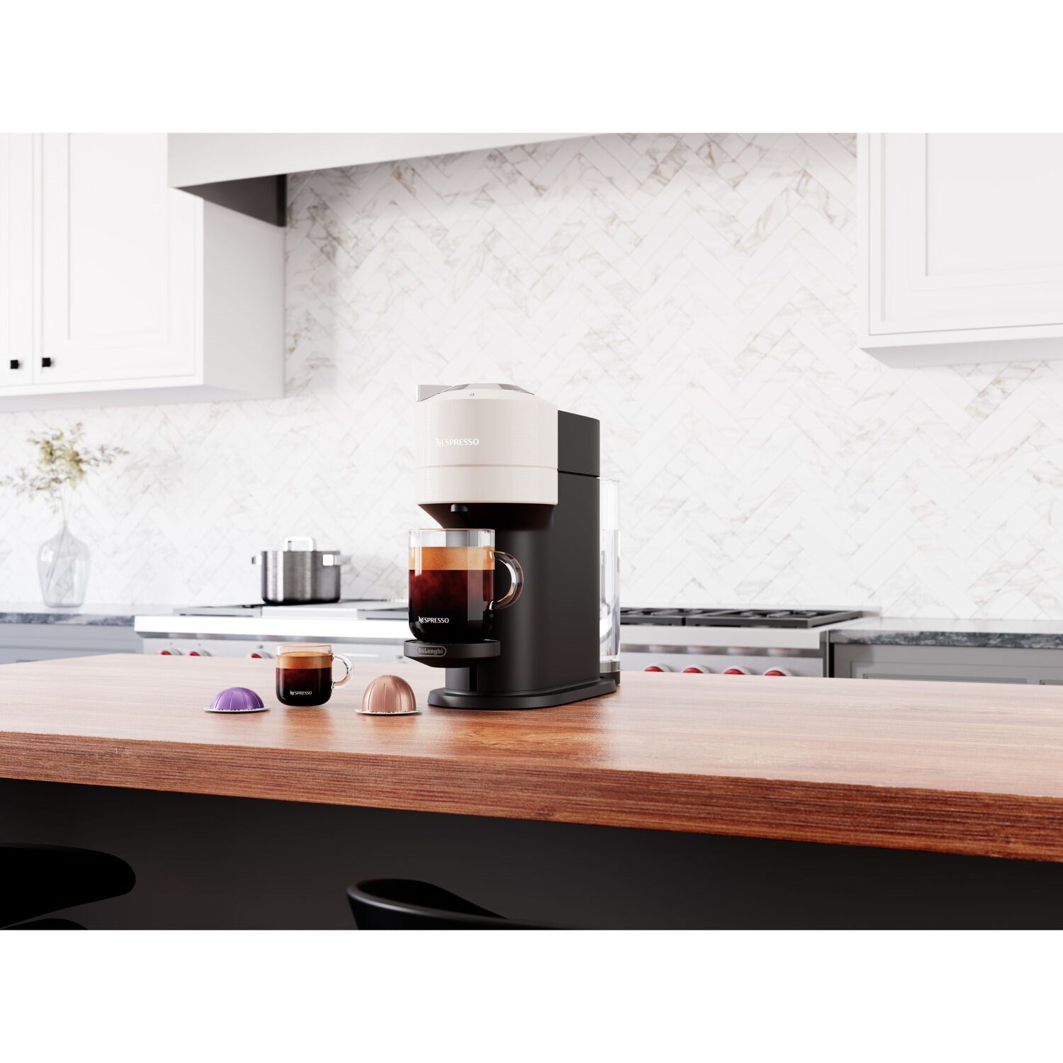 Vertuo Next coffee machine with countertop setup, white top and black base