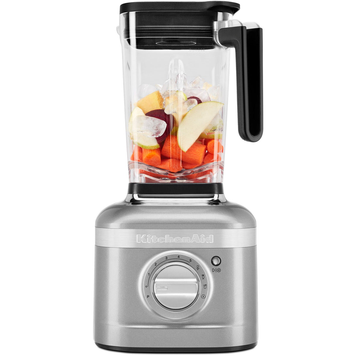 KitchenAid blender with clear jar showing chopped fruit and contour silver base