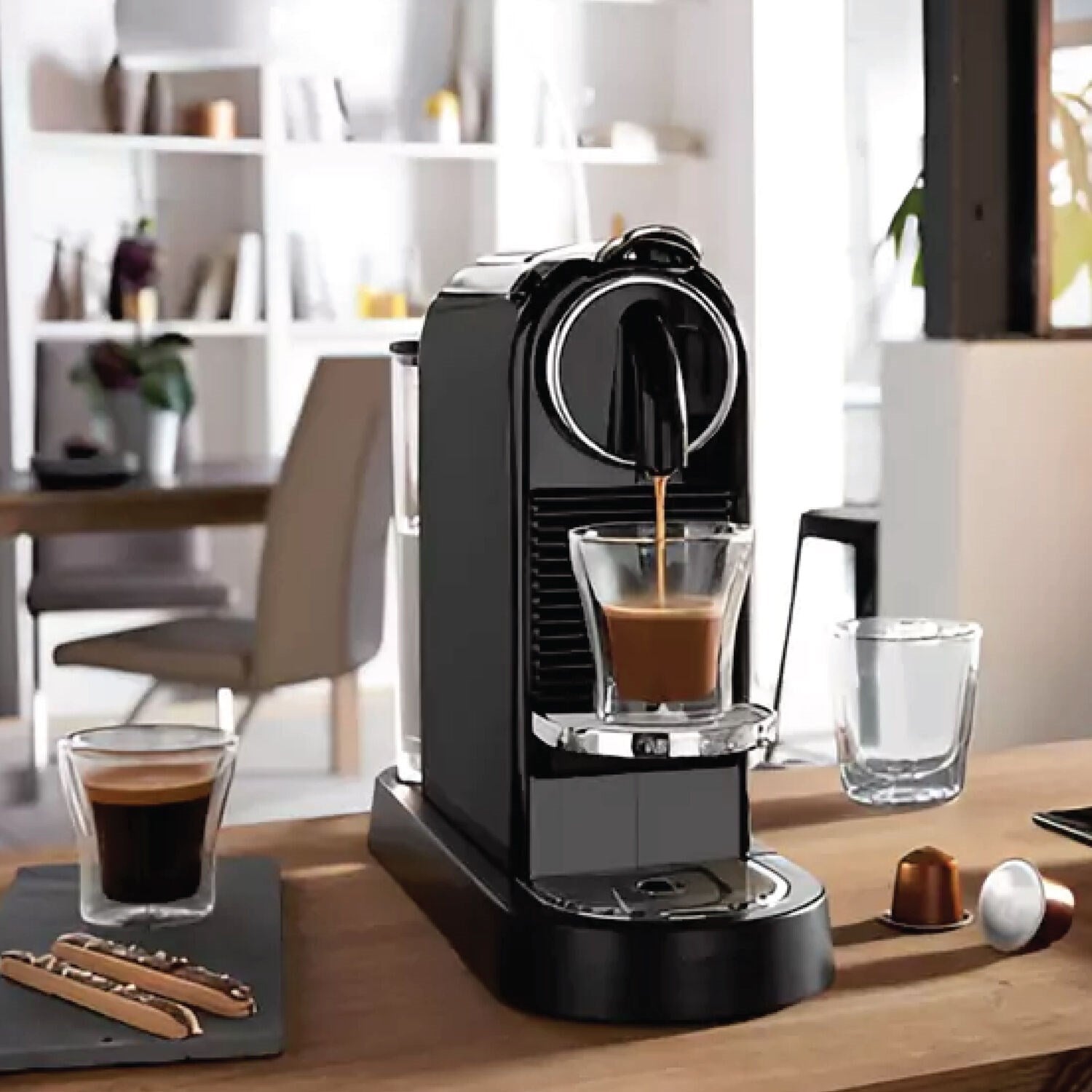 Black Nespresso Citiz espresso machine dispensing espresso into a cup
