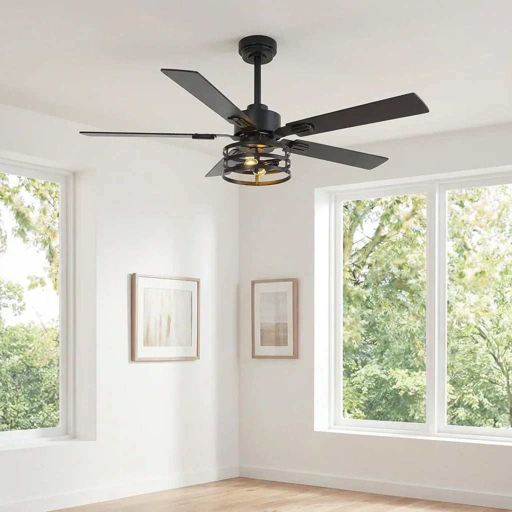 Ceiling fan with dark blades and integrated light in a bright corner room