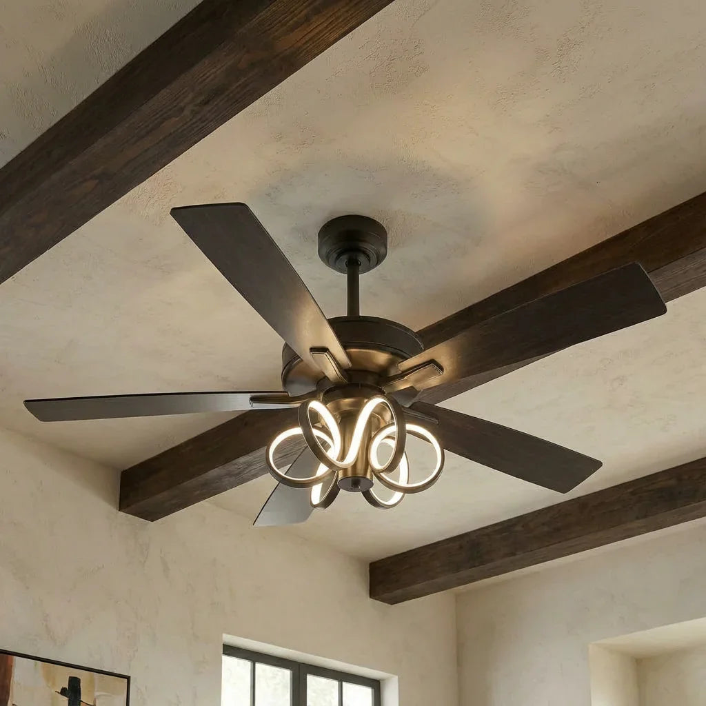 Ceiling fan with LED light, black motor, and dark wood blades in close-up