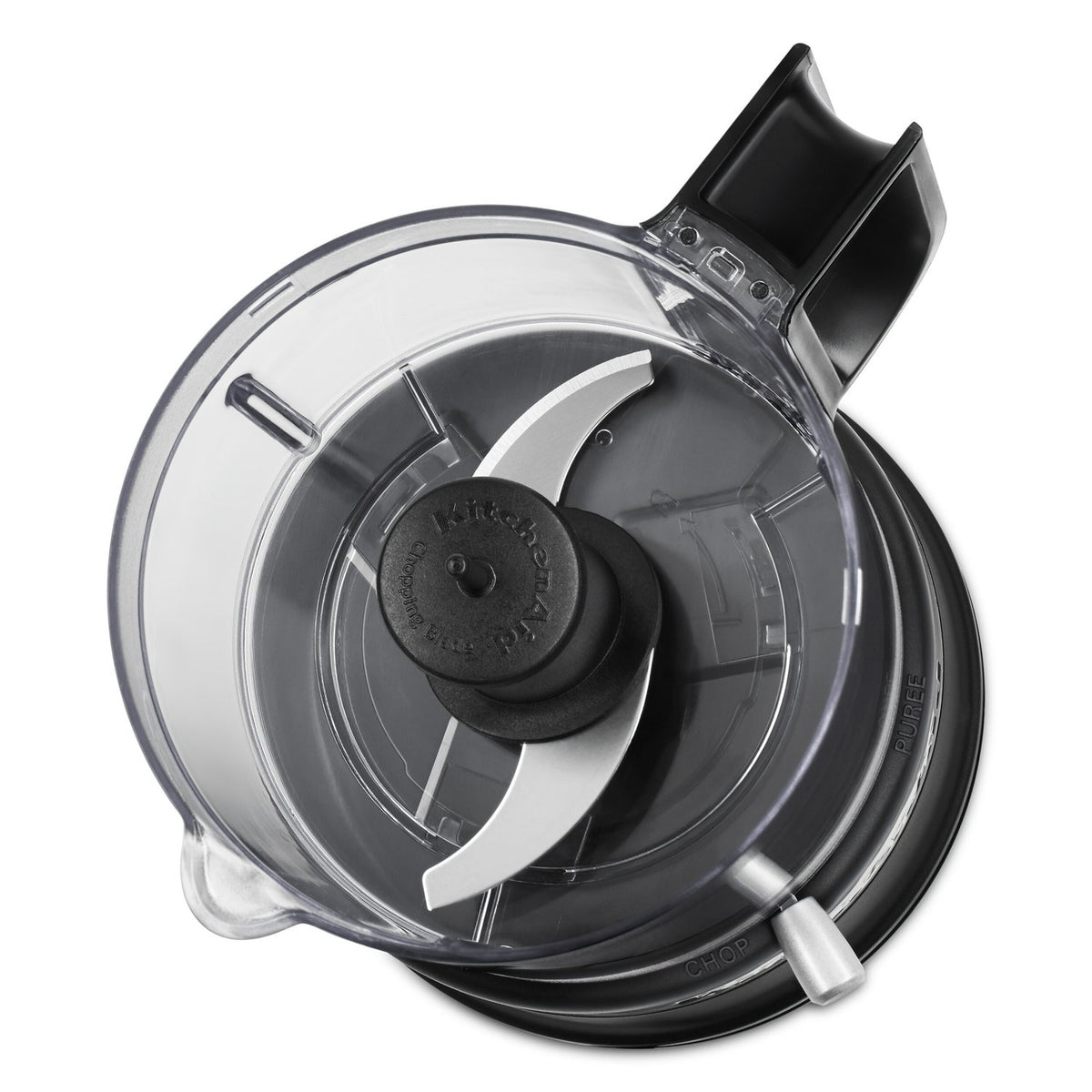 Food chopper blade assembly inside clear bowl with black blade hub
