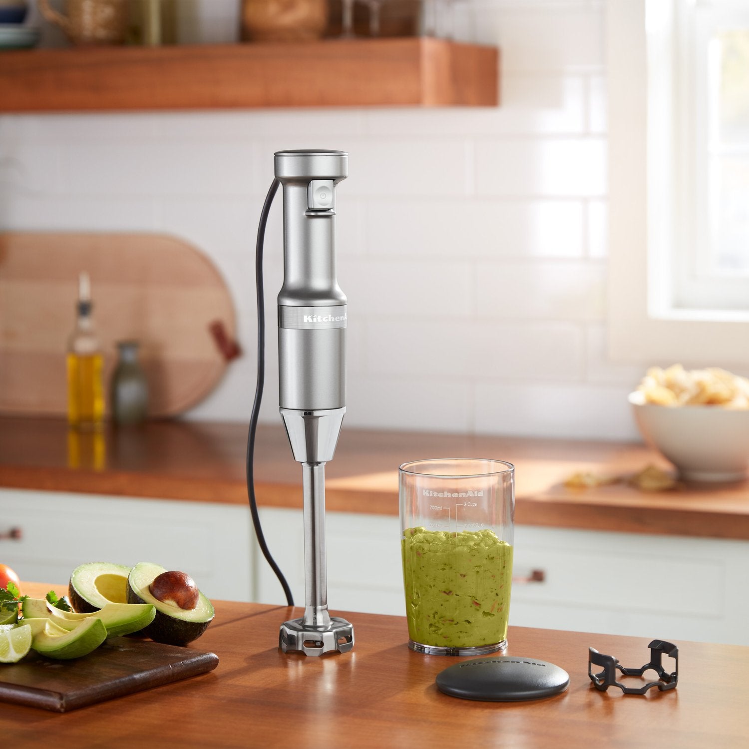 Contour Silver immersion blender with blending shaft and blending jar on countertop