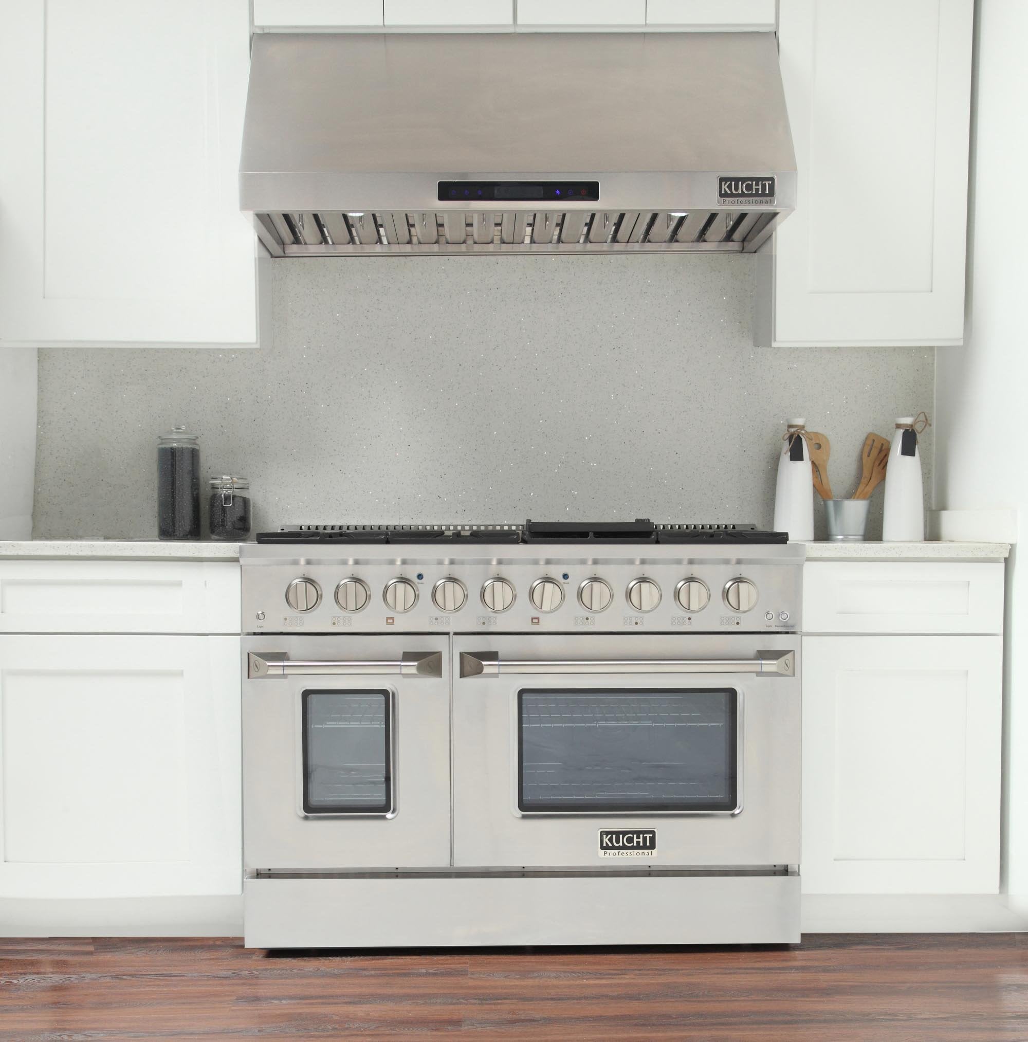 Stainless steel propane gas range in kitchen setting with burner grates and oven doors