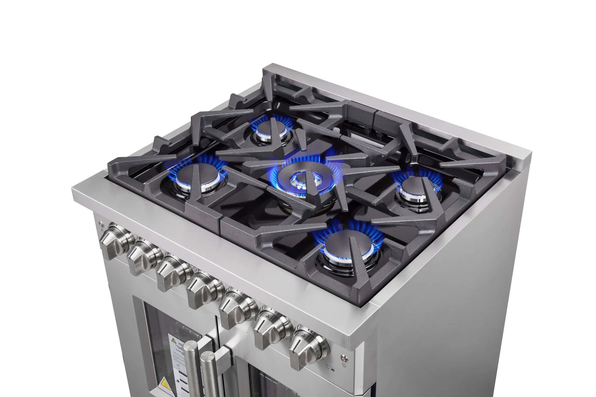 Stainless steel cooktop with five burners showing blue flames and metal control knobs