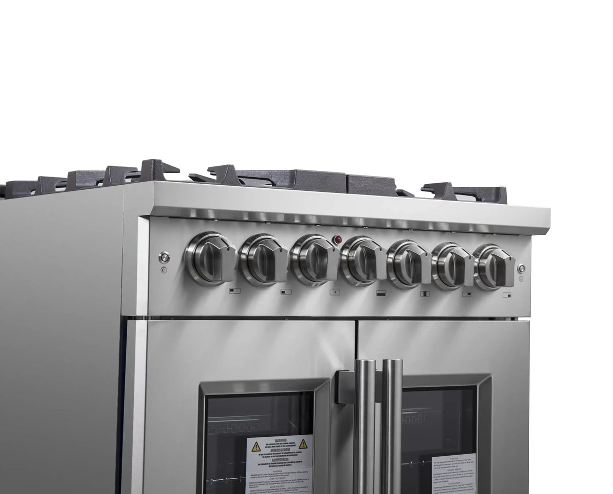 Stainless steel range control panel with round knobs above two oven door windows