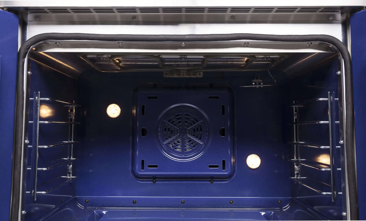 Dual fuel range oven interior with fan vent and two side rack rails