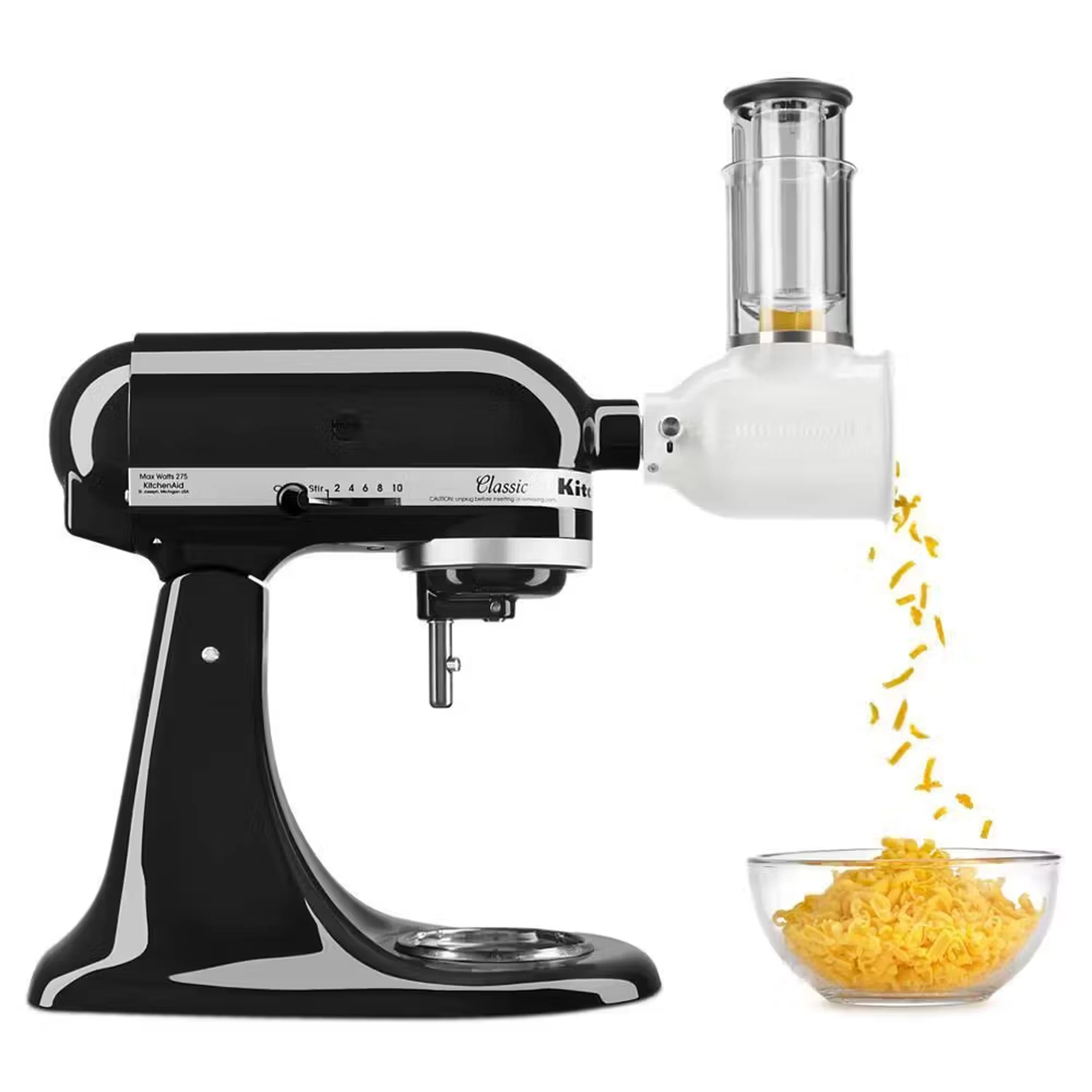 Onyx black stand mixer with stainless bowl pouring dry ingredient from chute