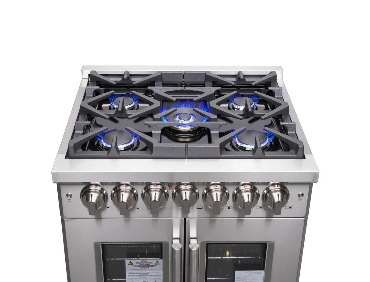 Stainless steel cooktop with five gas burners and blue flames under grates