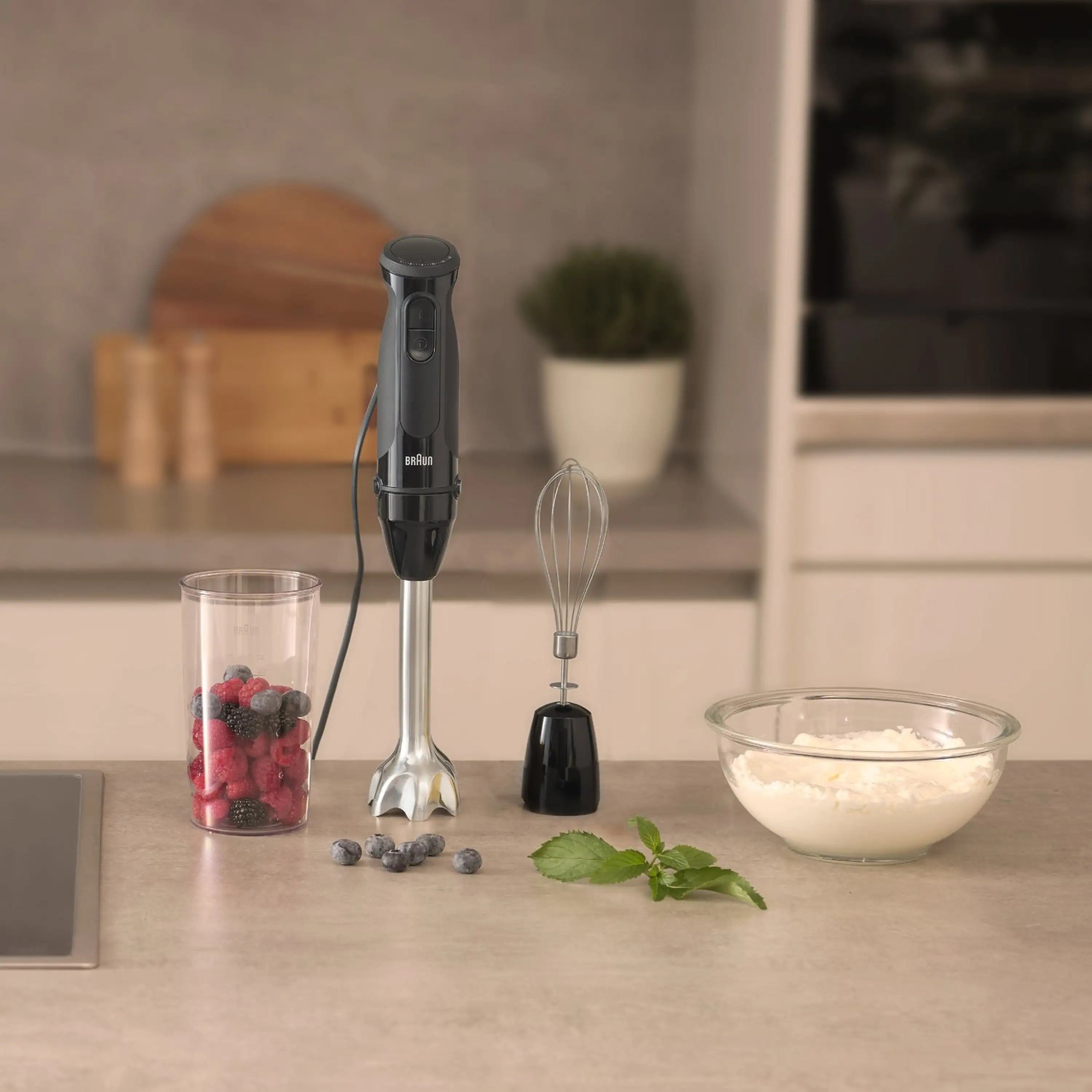 Black Braun hand blender with whisk attachment, stainless shaft and plastic beaker