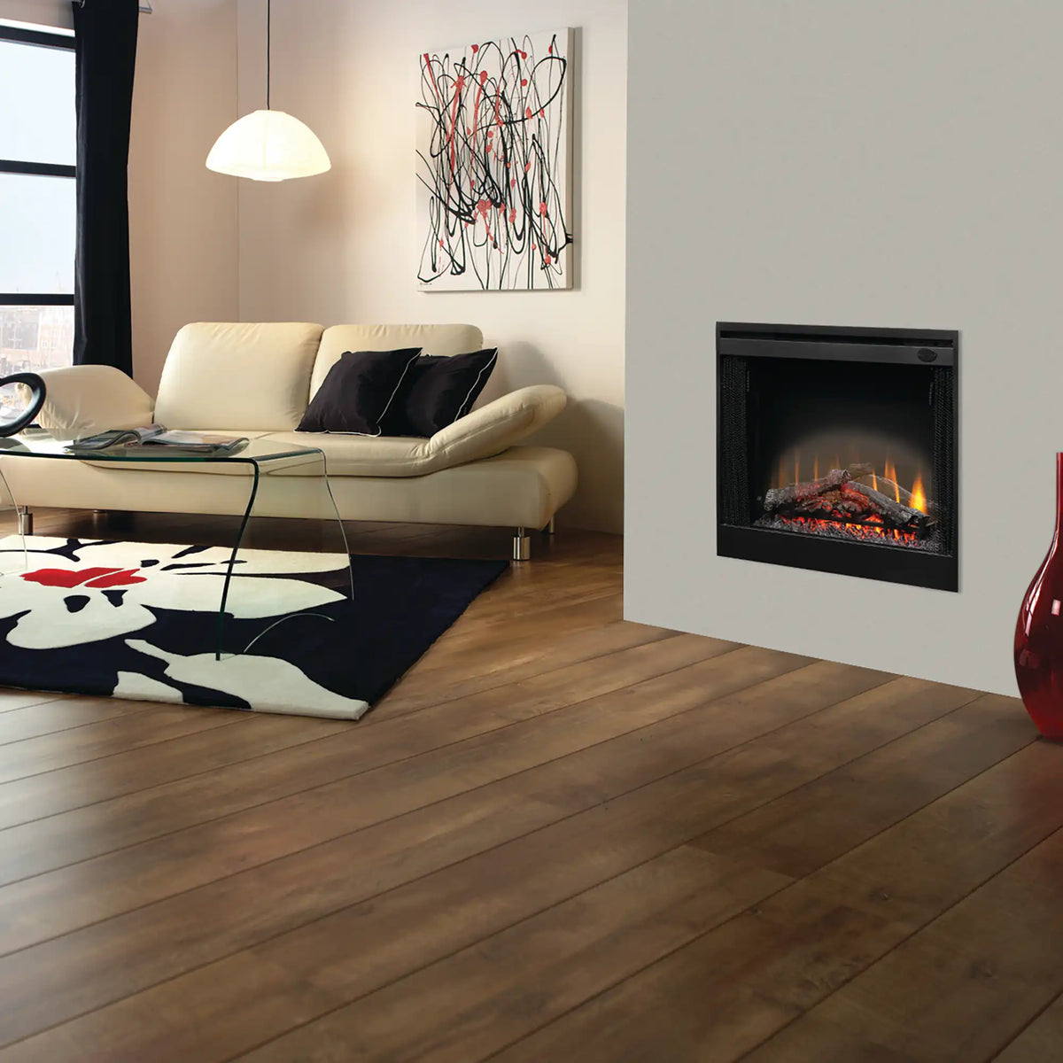 Black electric fireplace insert with glass front showing simulated logs and orange flames