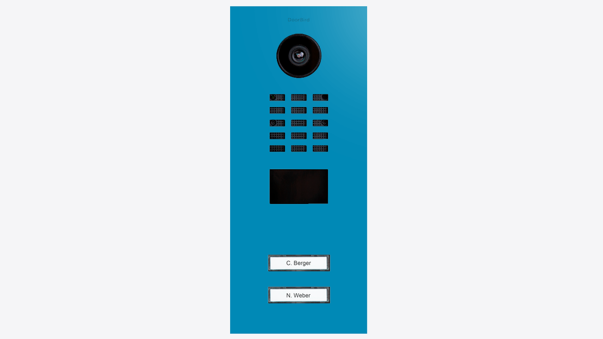 Light blue video door station faceplate with camera, speaker grille, and keypad