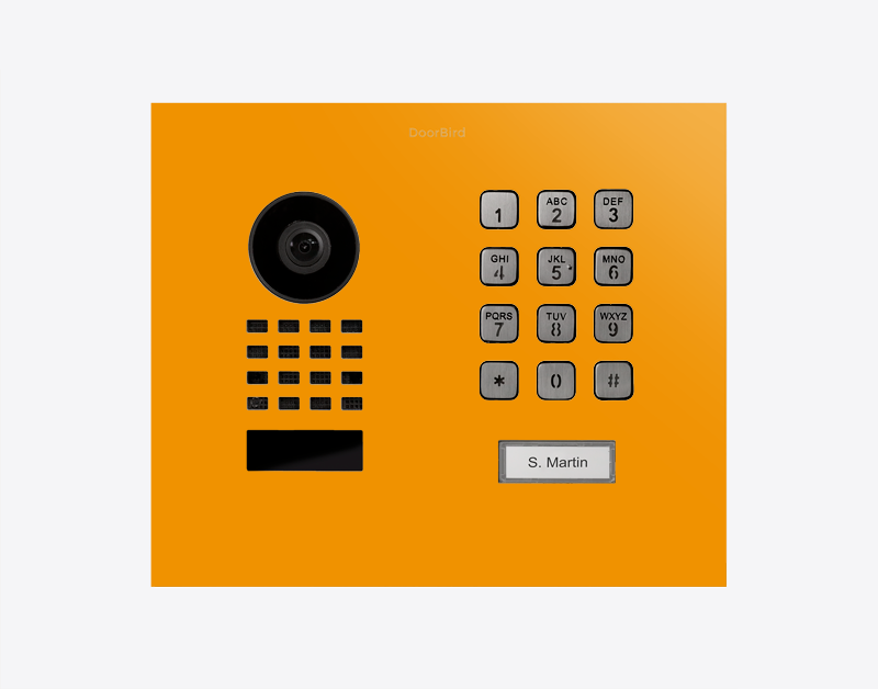 DoorBird flush-mount IP video door station with sun yellow face, keypad and camera