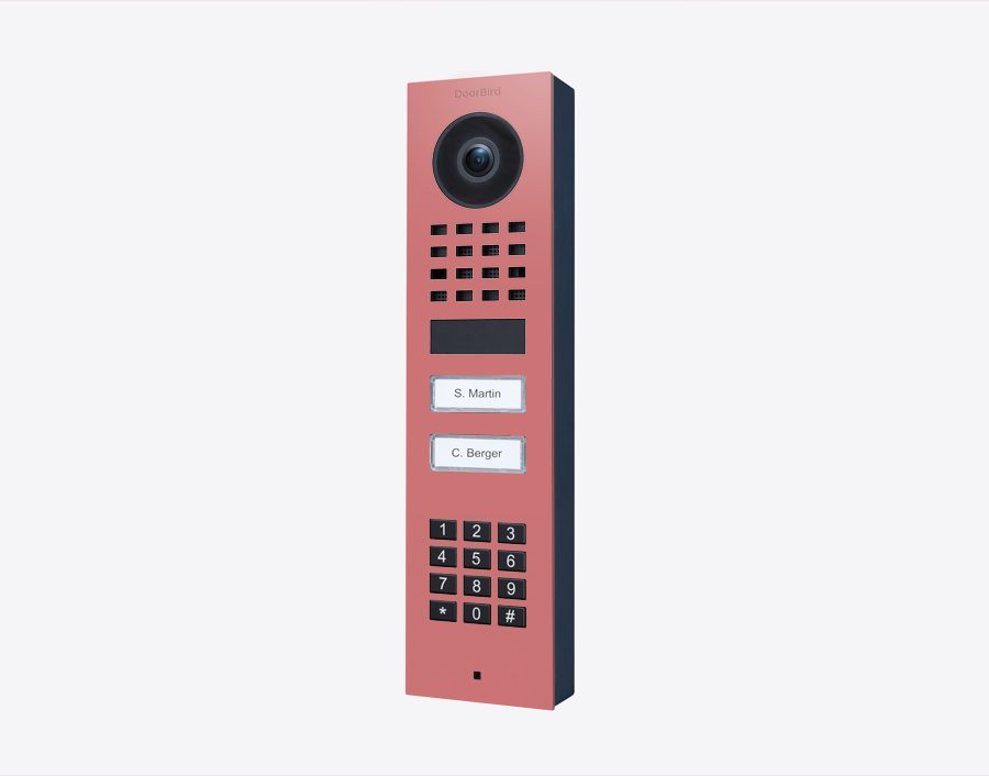 DoorBird antique pink video door station with camera lens, keypad, and two call buttons