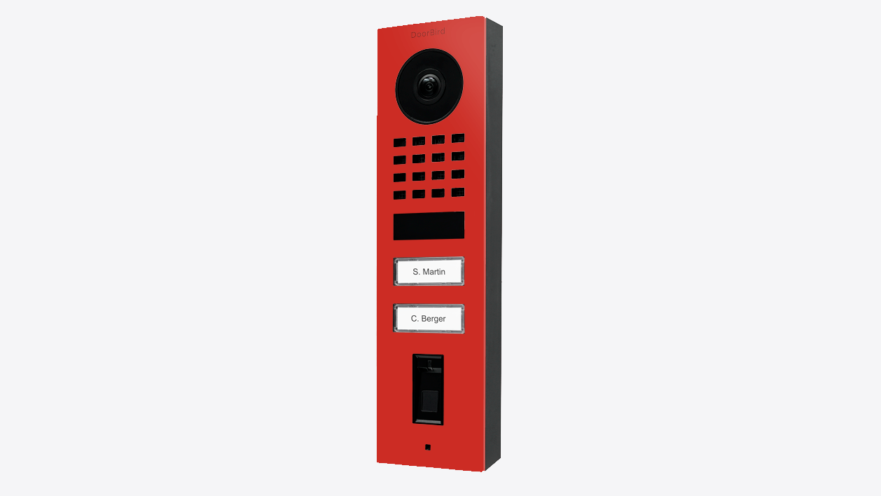 Video door station with red front panel, camera lens and keypad blocks.